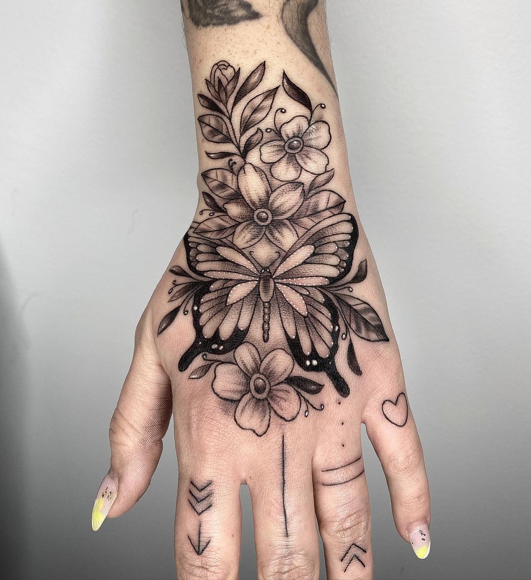 Stunning Butterfly tattoo on hand for girl