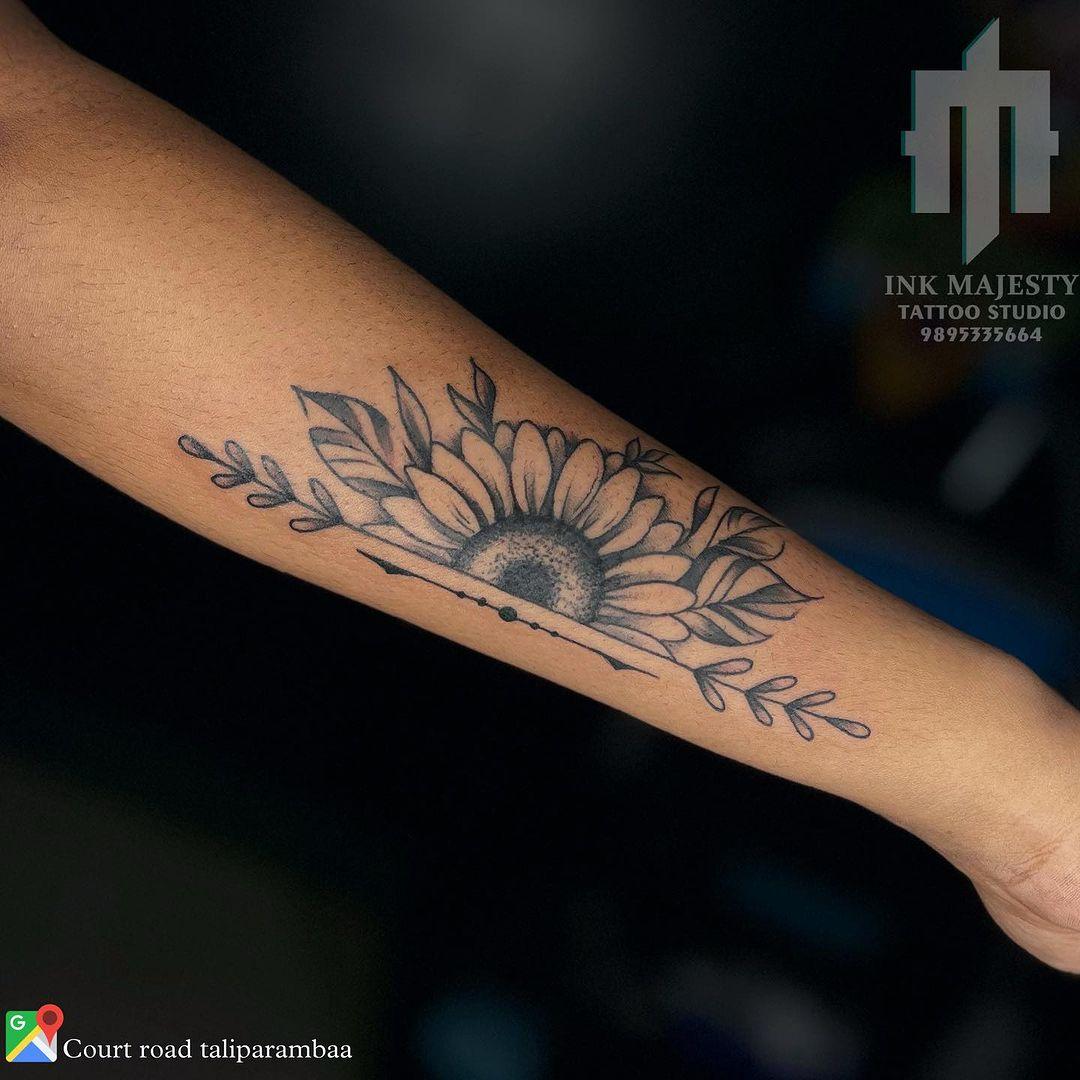 Half- sunflower tattoo